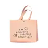 Bolsas de Mano de TNT de Alta Calidad para Empaque de Tiendas de Ropa para Mujer, Bolsas de Compras, Bolsas de Regalo con Logos Imprimibles