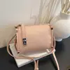 Bolso cuadrado pequeño transfronterizo moderno y elegante para mujer, nuevo modelo de verano 2026, bolso de hombro chic de color liso, bolso cruzado para el día a día