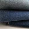 Nuevo tejido denim de sarga 10*7 azul con fondo negro, sin elasticidad, para ropa de minería y otros tejidos denim
