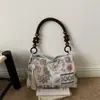 Bolso de hombro elegante y casual para mujer, con un diseño único y minimalista, una nueva colección de verano para 2026, y un bolso tote moderno y de nicho.