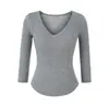 Blusa de Tricô Sexy com Decote em V Profundo e Manga Três Quartos para Meninas Quentes Outono e Inverno 2025 Nova Camisa Base Slim Fit que Marca a Cintura Camiseta