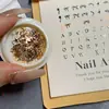 Uñas postizas estilo Xiaohongshu para Navidad, lámina de cobre ultrafina, lazo, estrella explosiva, letra, lentejuela, con sensación de alta gama, accesorios de arte de uñas