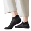 Calcetines de Venta Caliente Transfronteriza al por Mayor, Calcetines Desechables de Color Sólido Negro y Blanco, Calcetines de Algodón Unisex, Calcetines Desechables Diarios de Longitud Media-Corta Anti-Olor