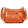 Bolsa de Tecido de Nylon Leve Repelente à Água Bolsa Transversal Casual para o Dia a Dia Novo Estilo Bolsa Simples de Bolinho Bolsa de Ombro Feminina da Moda