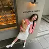 Saia reta branca de renda bordada, elegante e estilosa, para mulheres, novo modelo primavera/verão 2026, cintura elástica com cordão