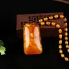 Cadena de suéter larga de cera de abeja vieja directa de fábrica, cadena de moda Joker, colgante de ámbar amarillo de cera de abeja, collar al por mayor