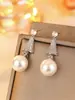Aretes de Perla Cobre Zirconia Cónicos de Lujo Más Vendidos Transfronterizos, Suministro Directo de Fábrica de Joyería de Yiwu, Personalizables