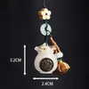 Bolsa de dinero de piedra luminosa da la vuelta flores ricas bolsa Baifu bolsita luminosa colgante de mano adornos de dormitorio jugar