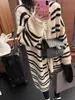 Cárdigan de punto de longitud media con capucha a rayas y bloques de color estilo coreano casual, suéter suave de manga corta nuevo para otoño e invierno