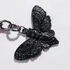 Explosiones Transfronterizas Ins Personalidad Viento Oscuro Dulce Fresco Plata Mariposa Cruzada Polilla Ahumada Llavero Colgante de Bolsa