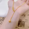 Tienda de Oro Mismo Estilo Oro Cepillado Ojo de Gato Borla Collar en Forma de Y para Mujer, Estilo Palacio Cadena Clavicular de Gama Alta