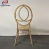 Silla de Comedor de Aleación de Aluminio al por Mayor Personalización Imitación Madera Plana Tubo Boda Silla de Boda Siete Postes Metal Fénix Silla de Bambú