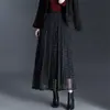 Falda plisada estampada negra para mujer, nuevo estilo otoño 2026, de cintura alta, adelgazante, falda de doble cara con un diseño fluido, elegante y amplio.