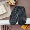 Pantalones para Niños 2026 Nuevo Estilo Otoño Moda para Niños Versátiles a Cuadros Pantalones Largos para Niñas Primavera Otoño Pantalones Casuales para Bebé
