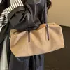 Bolsa de mano para el trabajo Coreana Otoño Invierno Gamuza Nuevo Terciopelo 2026 Sensación Hombro Único Bolso de Moda Japonés de Mano Femenina Gran Capacidad