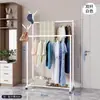 Perchero de pie de hierro forjado con doble barra, simple estante multiusos para ropa para dormitorio del hogar con ruedas