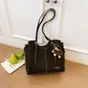 Bolso tote diario de color liso transfronterizo, bolso de gran capacidad de moda para mujer, nuevo estilo Otoño 2026, bolso de hombro único a la moda para ir al trabajo
