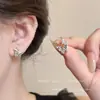 Modernos y Minimalistas Brazaletes para Oreja Retorcidos de Piedra Ojo de Tigre para Mujer, Pendientes Versátiles Vintage, Accesorios para Orejas de Otoño e Invierno con un Toque de Lujo Ligero y de Alta Gama