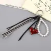 Colgante de Teléfono Móvil para Colgar en Bolso Serie Miu Otoño e Invierno Maillard de Gama Alta, Colgante Decorativo de Corazón de Melocotón Versátil y Moderno para Mujer