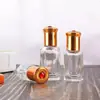 Botella de Vidrio Octagonal con Bola Rodante para Venta al por Mayor, Botella con Bola Rodante, Botella de Perfume, Botella de Aceite Esencial, Botella con Bola Rodante y Tapa Solar, Portátil