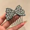 Peine elegante y voluminoso para mujer, creando un look dulce y encantador con un pasador de lazo, perfecto para un peinado alto y versátil, nuevo peine y accesorios para el cabello 2026
