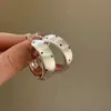 2026 Nuevos Pendientes de Plata Cepillada con Puntos Estilo Coreano y Japonés Moda de Gama Alta Versátiles Temperamento Simple Personalidad de Nicho Mujer