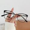 Gafas de moda con montura metálica antiazul, modernas, con diseño de ojo de gato, con bordes ahuecados, para mujeres europeas y americanas de alta gama.