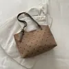 Bolsa feminina de grande capacidade para uso transfronteiriço, nova coleção outono 2026, bolsa de ombro versátil e elegante, bolsa tote moderna e casual para o trabalho e uso diário