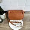 Bolsas Retrô de Nicho Outono 2026 Nova Bolsa de Ombro de Nicho de Alta Qualidade Bolsa Transversal Bolsa de Axila Elegante e com Temperamento