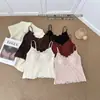 Camisola de encaje con diseño de espina de pescado tridimensional, diseñada para acentuar la cintura y el abdomen, creando una silueta estilizada y elegante con una estética suave y vintage.. 2619