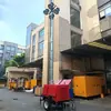 Dispositivo de iluminación móvil montado en remolque con postes de luz ajustables para la construcción de túneles, vehículo de iluminación móvil con elevación automática