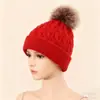 Chapéus de Tricô Populares Outono e Inverno Transfronteiriços Chapéus de Lã Torcidos com Pompons Únicos Chapéus Quentes para Adultos Frio Europeus e Americanos Chapéus de Fio Versáteis de Cor Pura