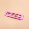 Europa y Estados Unidos ambiente simple clip de aceite triangular de alta gama no daña el cabello pasador de metal color caramelo tocado de niña venta al por mayor