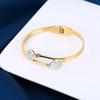 Pulsera de acero inoxidable Trébol con diamantes completos de venta caliente transfronteriza, pulsera de moda de acero de titanio con circonita, pulsera para mujer al por mayor