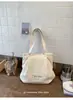 Bolso tote de rayas plisado suave estilo coreano, simple y artístico, relajado y calmante, adecuado para estudiantes universitarios, bolso de hombro para la mañana temprano