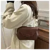 Bolsa de Axila de Design de Nicho Nova para o Inverno de 2024 Textura Leve Luxo Moda Casual Selim Bolsa Feminina Bolsa de Ombro Retro