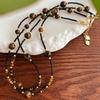 Estilo Nacional Vintage Nicho Sentido de Alta Gama Estilo Maillard Ojo de Tigre Natural Imitación Cristal Negro Puntiagudo Collar Cadena Clavícula
