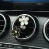 Aromaterapia para Coche Salida de Aire Acondicionado Decoraciones Decoración Perfume Suministros para el Interior del Coche Flores de Cinco Pétalos Cruz de Metal Transfronterizo