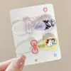 Serie de pato clip de Kitty de Sanrio un par de accesorios de acrílico de dibujos animados material hecho a mano para bricolaje tocado zapatos combinación de flores
