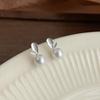 Pendientes de perlas de alta gama versátiles de estilo coreano, diseño de nicho femenino, pendientes de circonita de lujo de moda, pendientes al por mayor