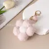 Pendente criativo de flor colorida de pelúcia, bolinha de pelo de flor pequena, chaveiro pequeno fresco para atacado, acessórios para carro, pingente de bolsa