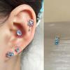 Clavos de Hueso de Oído de Acero de Titanio Diseño de Nicho Zircón Azul Lazo Clavos Cocleares Exquisitos Lujo Ligero Perforación de Oreja Tendencia al por Mayor