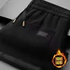 Pantalones deportivos de chenilla para hombre, otoño e invierno, forrados de felpa, engrosados, cálidos, pantalones casuales, corte recto, ajuste holgado, adecuados para hombres de mediana edad y mayores