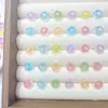 Nuevas Decoraciones de Arte de Uñas de Caricatura de Dulces Coloridos y Donas Serie de Juguetes Comestibles Transparentes de Hielo Accesorios de Resina para Fundas de Teléfono de Uñas Lindas