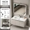 Gabinete de banheiro integrado com armário para pia, pia de cerâmica e design de parede para uma configuração completa de banheiro