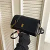 Bolso de Hombro Nuevo de Moda Primavera 2026 Diseño de Nicho Casual Bolso Cuadrado Pequeño Textura de Moda Bolso Cruzado para Mujer