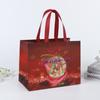 Em estoque bolsa de Natal transfronteiriça sacola de embalagem para presente portátil dobrável filme metalizado não tecido sacola personalização