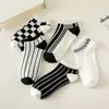 Venta al por mayor de calcetines invisibles de corte bajo para hombre y mujer de Zhuji Sock Manufacturers, calcetines cortos y de altura media para las temporadas de primavera y verano