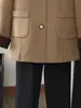 Nueva colección de otoño e invierno para mujeres de mediana edad: un elegante abrigo de lana de doble cara de longitud media de alta gama con un cuello de contraste