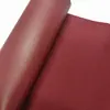 Venta al por mayor directa de fábrica descuento 600D 3x 25 Tela Oxford impermeable roja ampliamente utilizada en niños